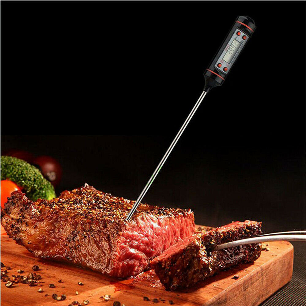Quick-check thermometer with long probe in meat